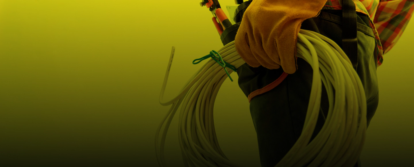 man with wires and tools